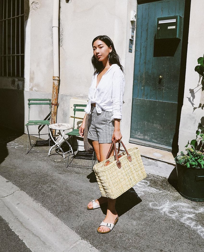 White linen shirt tied at waist with striped shorts — Simple Beach Waves