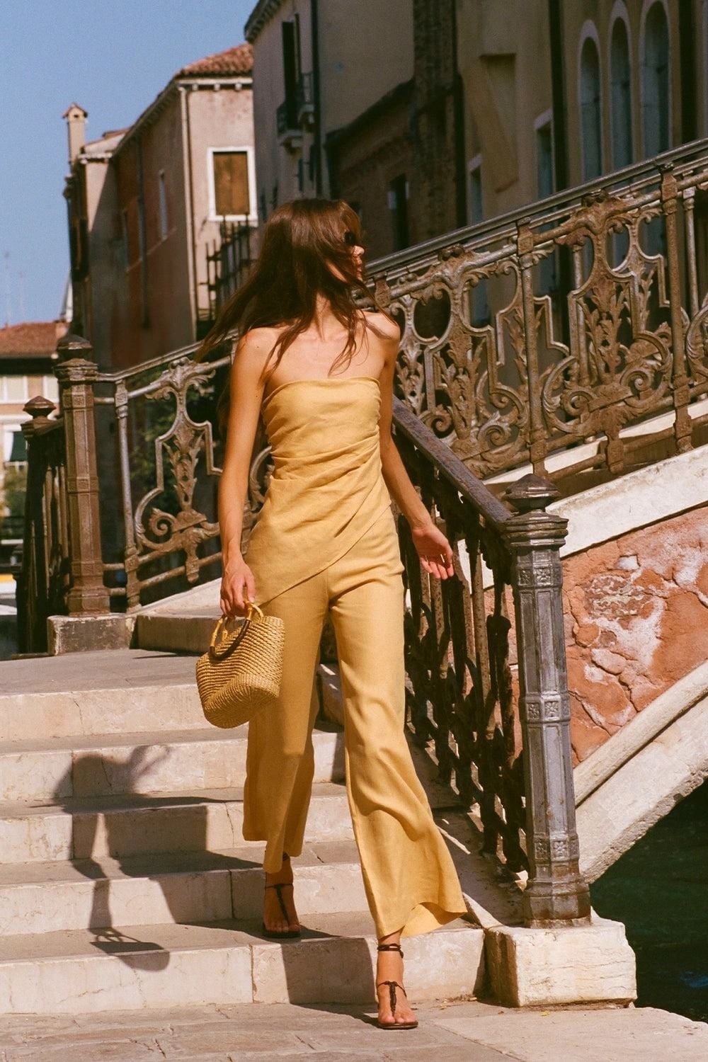 Pale yellow strapless jumpsuit with wide legs — Simple Beach Waves
