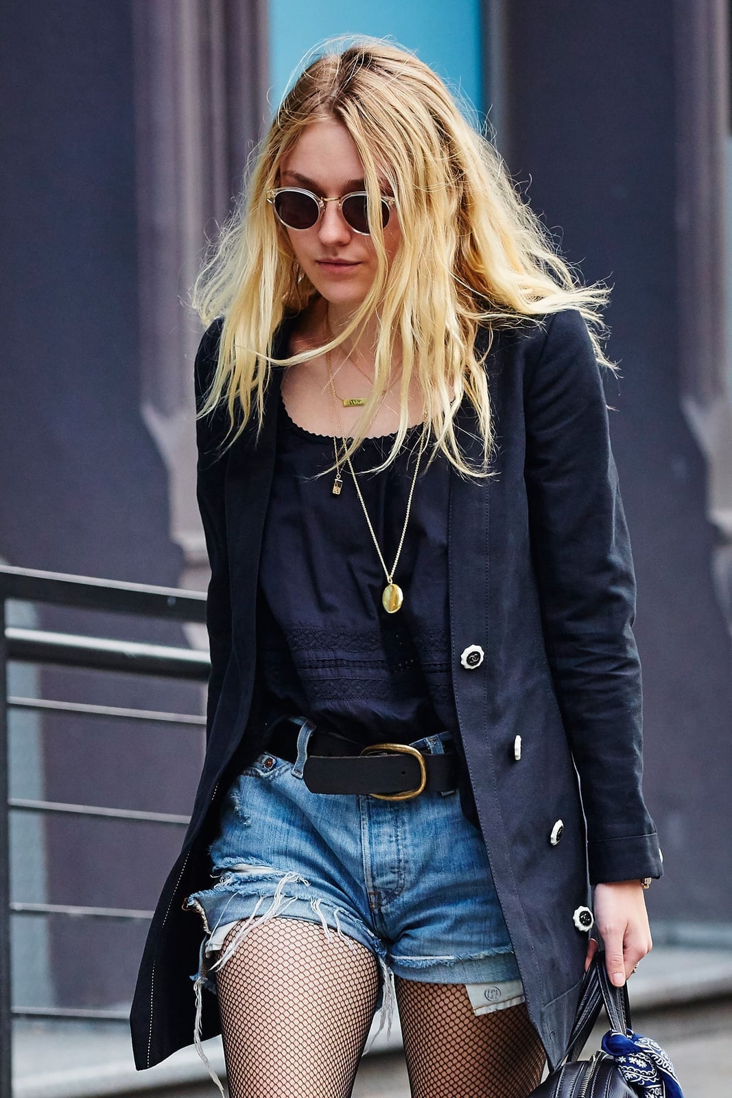 Ripped denim shorts and black blazer beach look — Simple Beach Waves