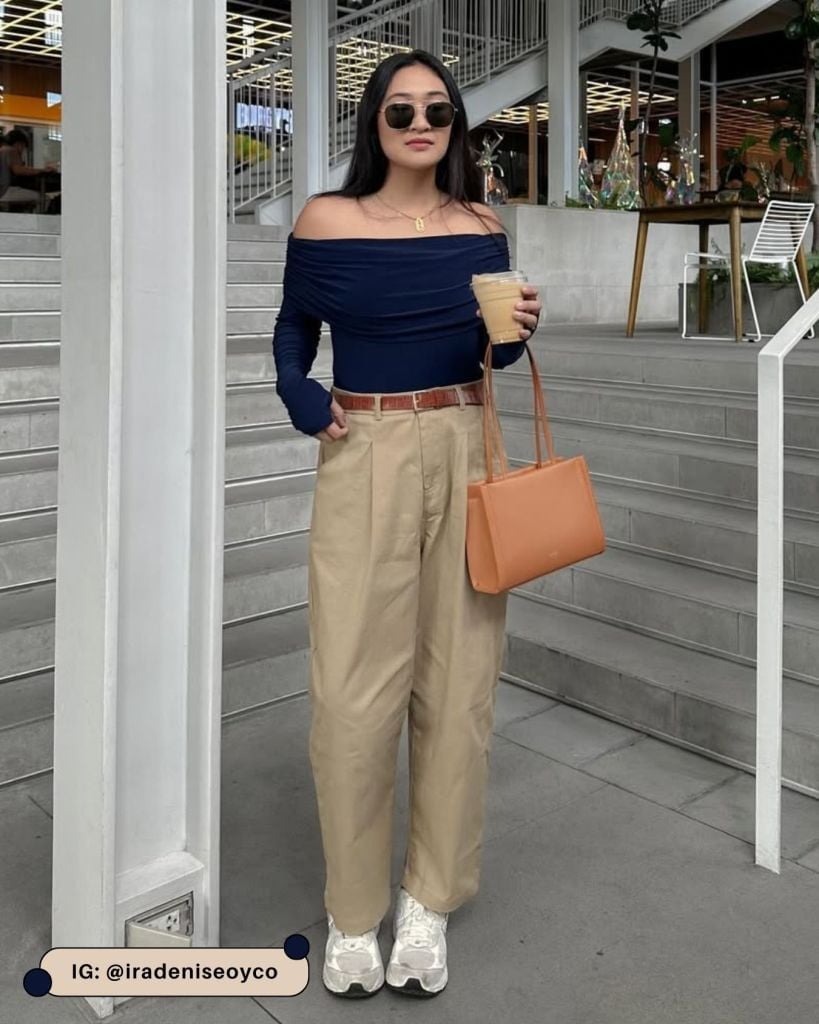 Beige pleated wide-leg trousers with a navy off-the-shoulder top — Simple Beige Pants Outfits
