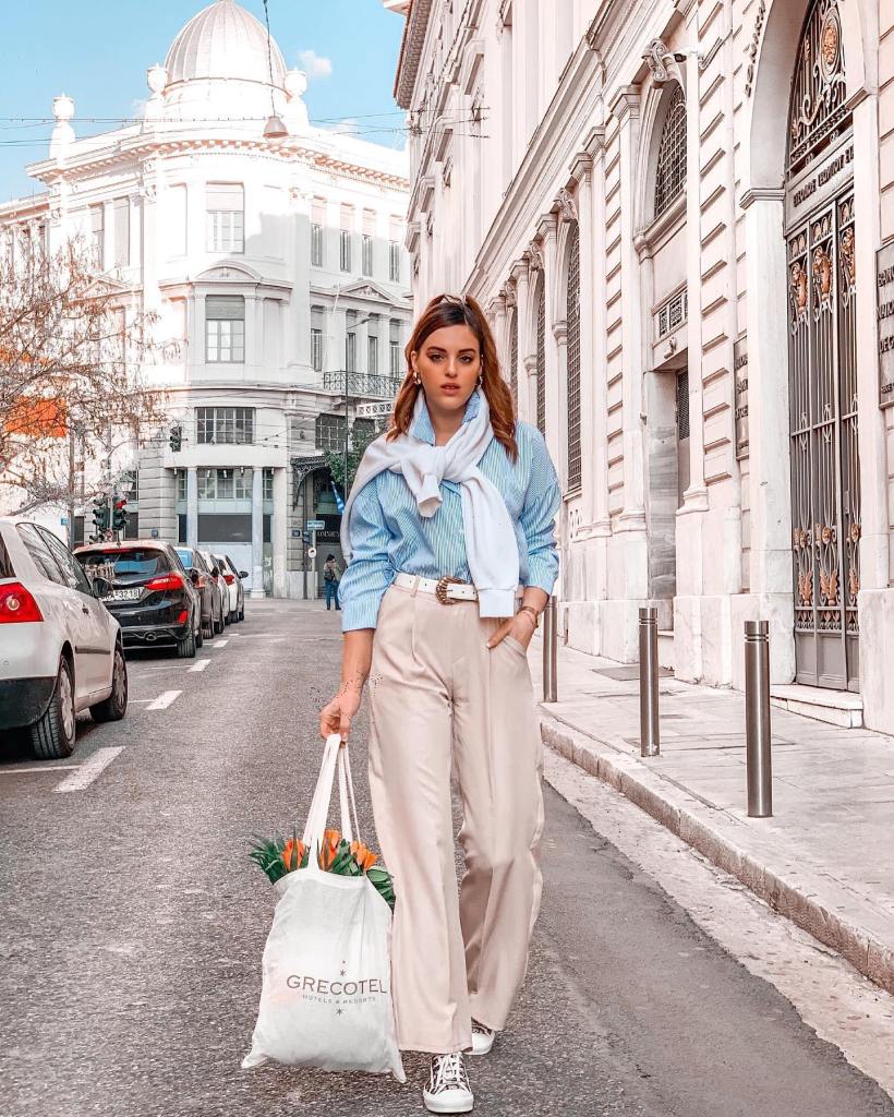 Beige wide-leg pants with a striped shirt and draped sweater — Simple Beige Pants Outfits