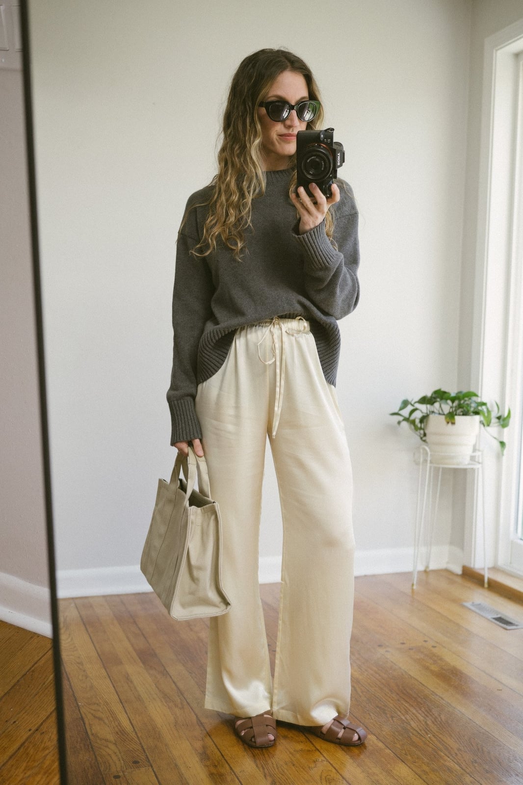 Cream silk wide-leg trousers with an oversized gray sweater — Simple Beige Pants Outfits