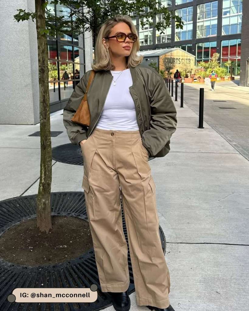 Beige wide-leg cargo pants with a green bomber jacket — Simple Beige Pants Outfits
