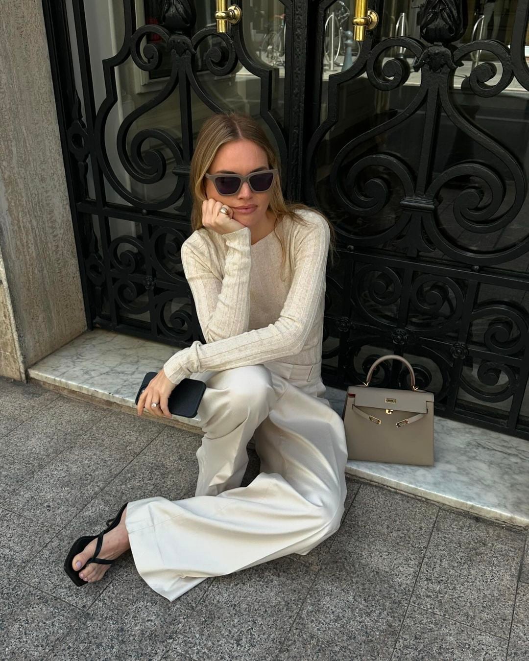 Cream silk wide-leg trousers with a ribbed knit top — Simple Beige Pants Outfits