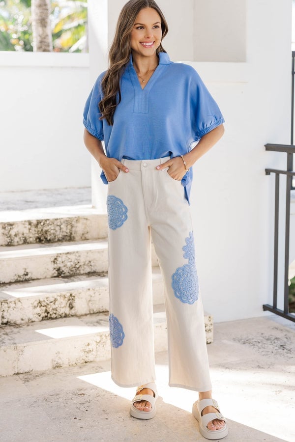 Light blue v-neck blouse with cream embroidered pants Light blue v-neck blouse with cream embroidered pants — Simple Blue Top Outfits