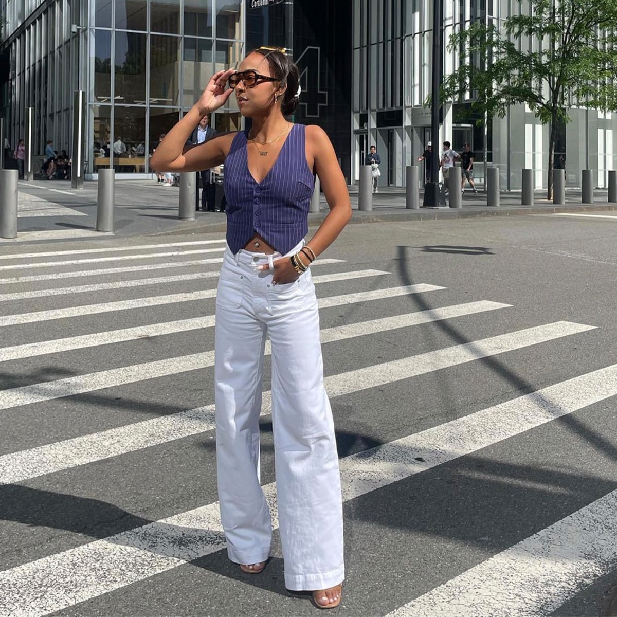 Blue pinstripe vest with white wide-leg pants Blue pinstripe vest with white wide-leg pants — Simple Blue Top Outfits