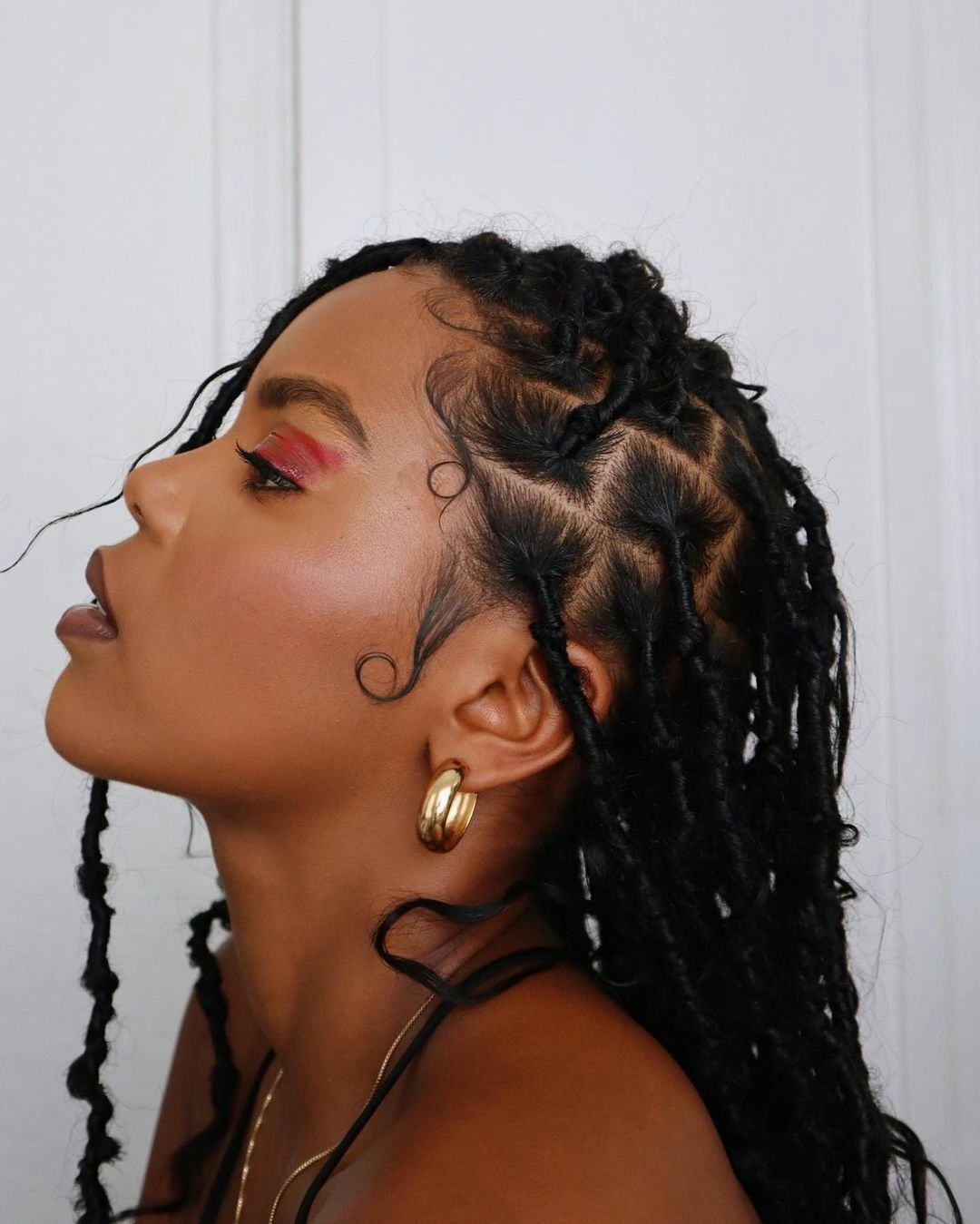 Shoulder Length Black Wavy Locs With Geometric Parting Shoulder Length Black Wavy Locs With Geometric Parting — Simple Braids Locs