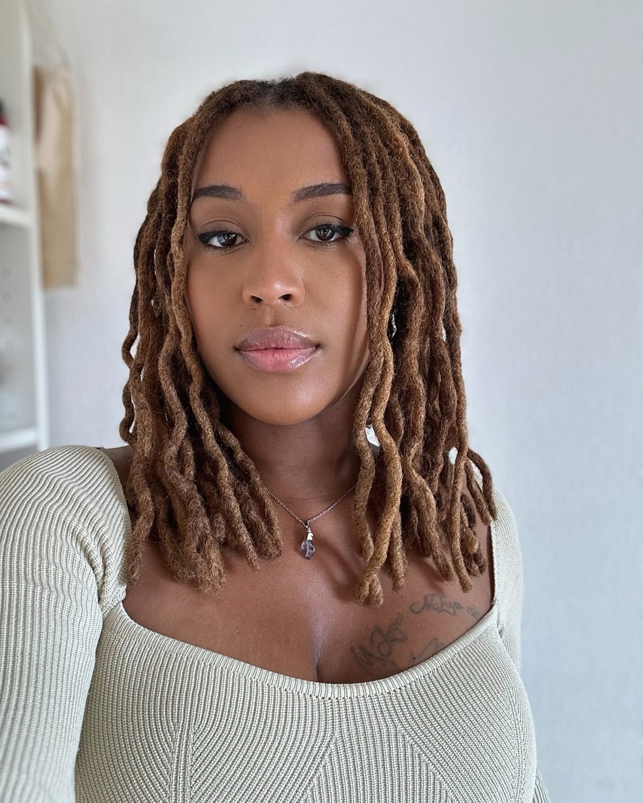 Shoulder Length Wavy Locs With Highlights Shoulder Length Wavy Locs With Highlights — Simple Braids Locs