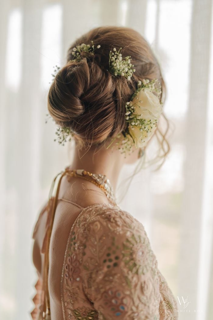 Textured Dark Brown Bun with Florals — Simple Bridal Bun