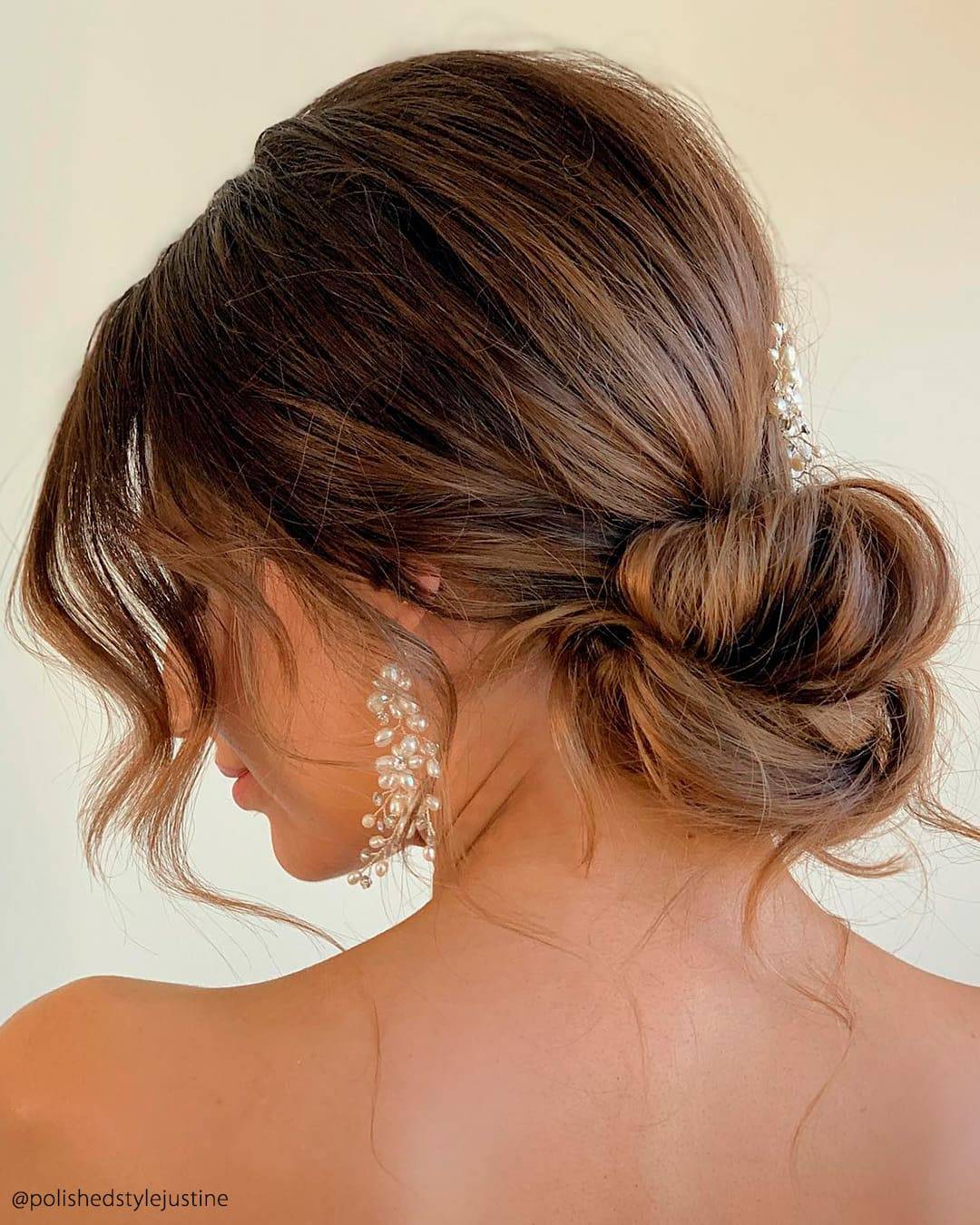 Textured Medium Brown Bun with Wispy Bangs — Simple Bridal Bun