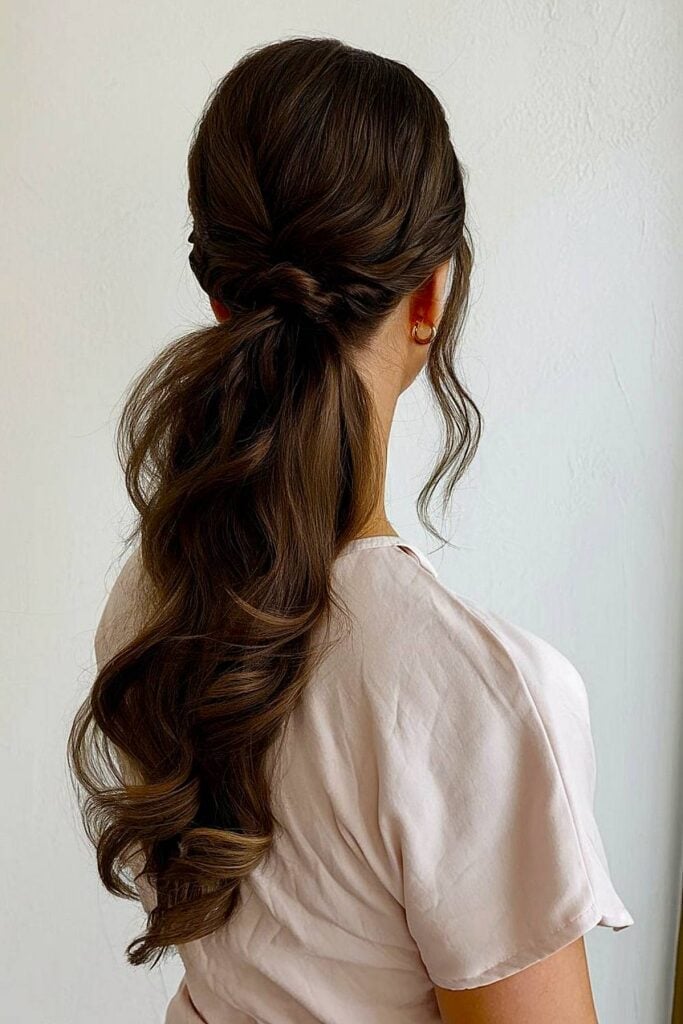 Glossy Dark Brown Wavy Ponytail with Side Bangs — Simple Bridesmaid Ponytail