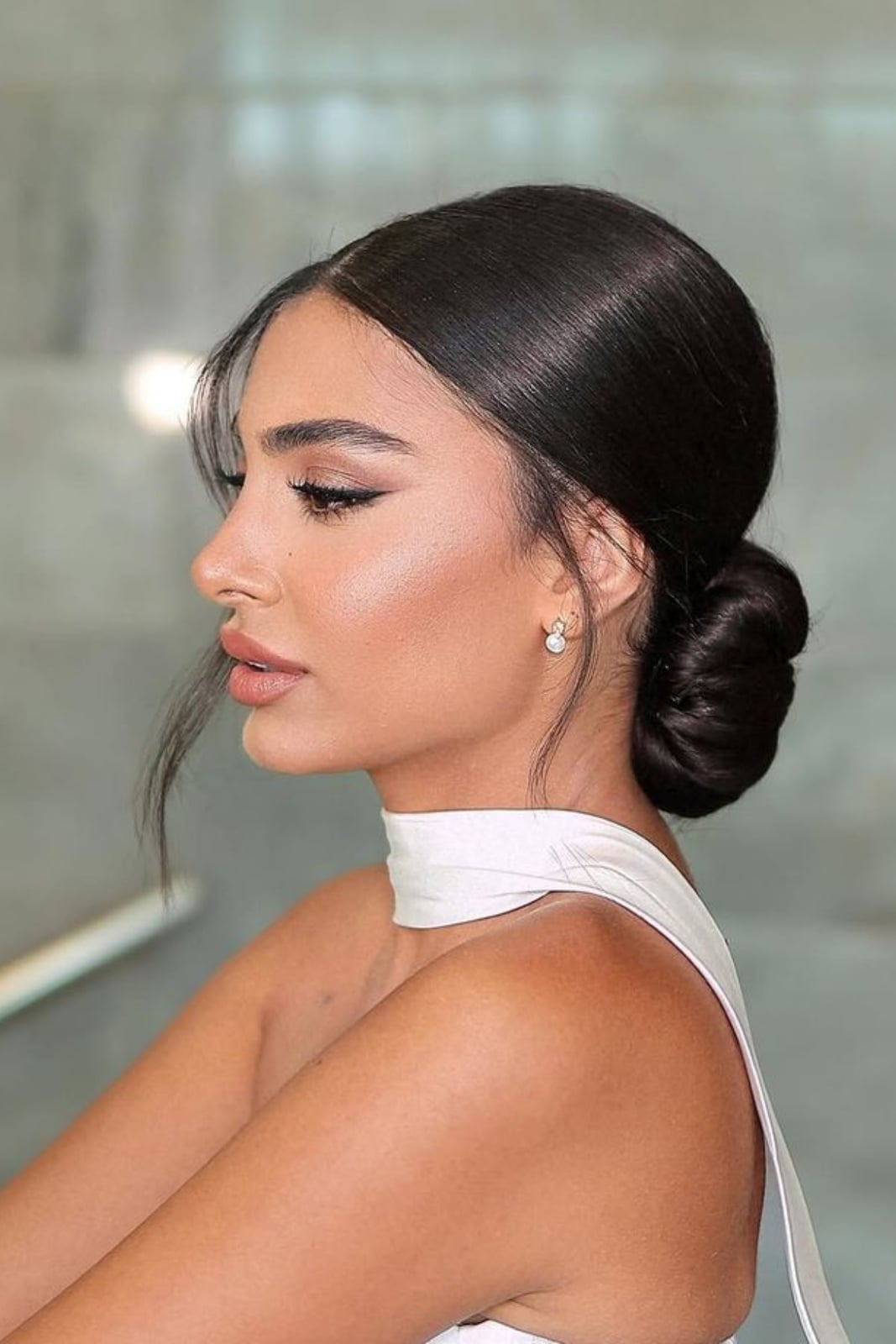 Dark Brown Sleek Low Bun With Wispy Bangs — Simple Bridesmaid Updos