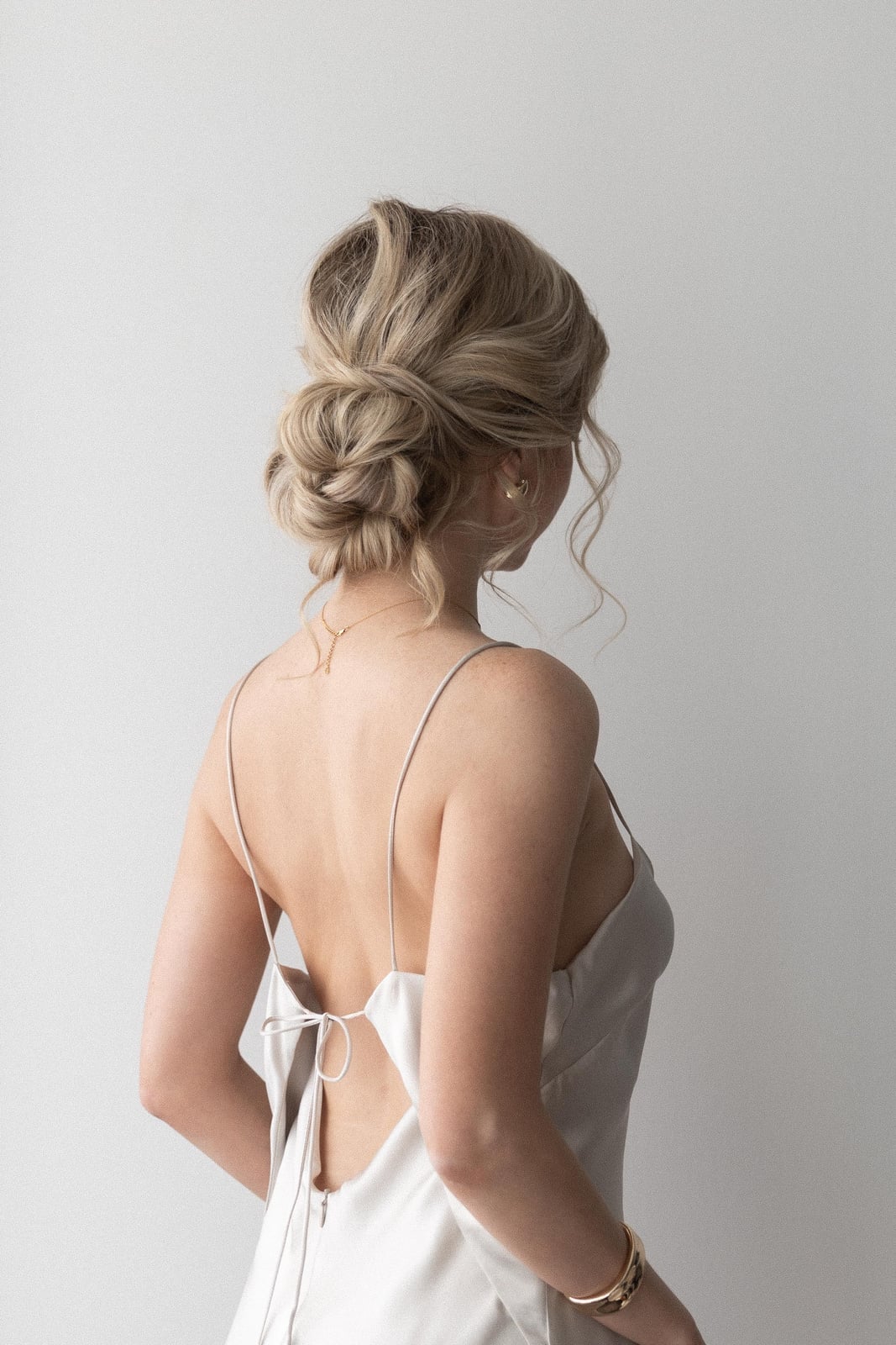 Ash Blonde Messy Bun With Braided Accents — Simple Bridesmaid Updos