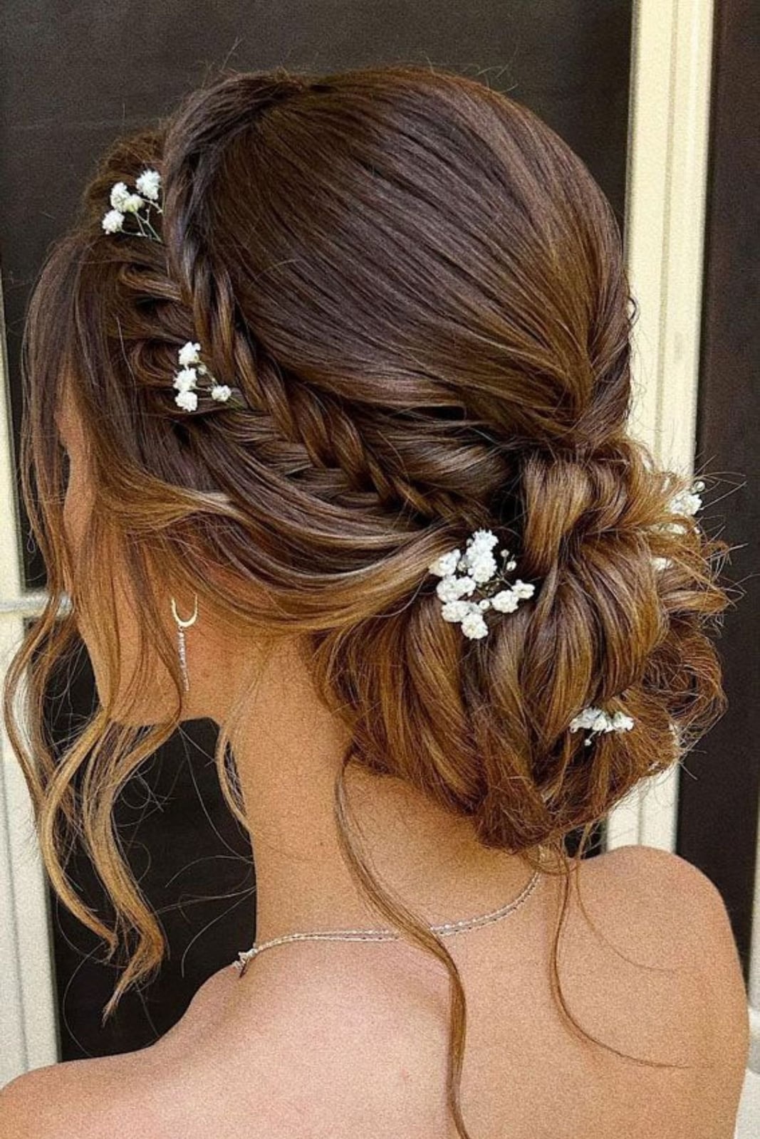Brown Braided Updo With Flowers and Wispy Bangs — Simple Bridesmaid Updos