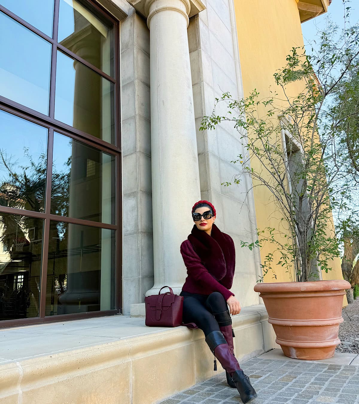 Fitted Burgundy Pants With Faux Fur Jacket, And Coordinating Boots — Simple Burgundy Pants Outfits
