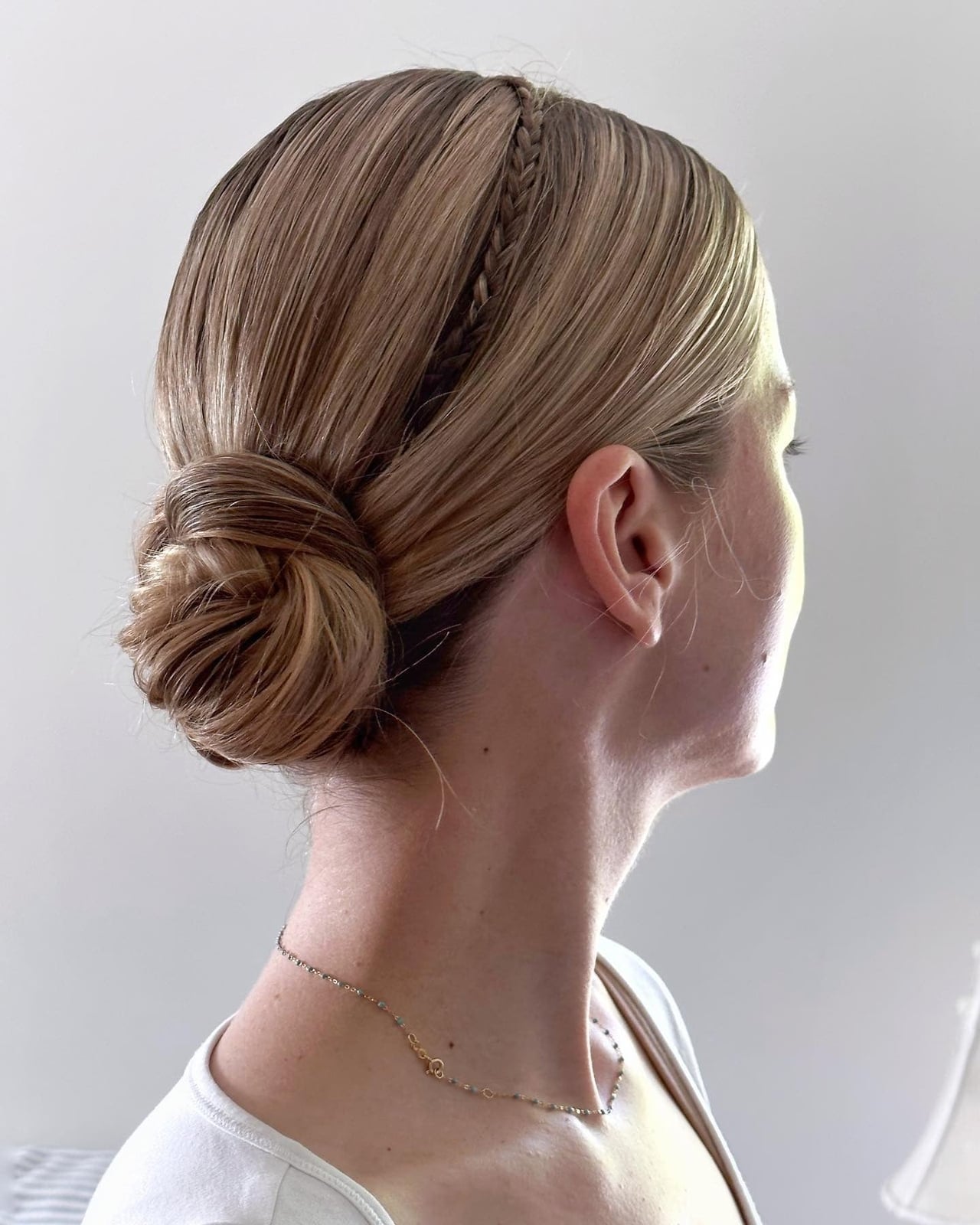 Low Bun With Delicate Braid Accent — Simple Casual Hairstyles
