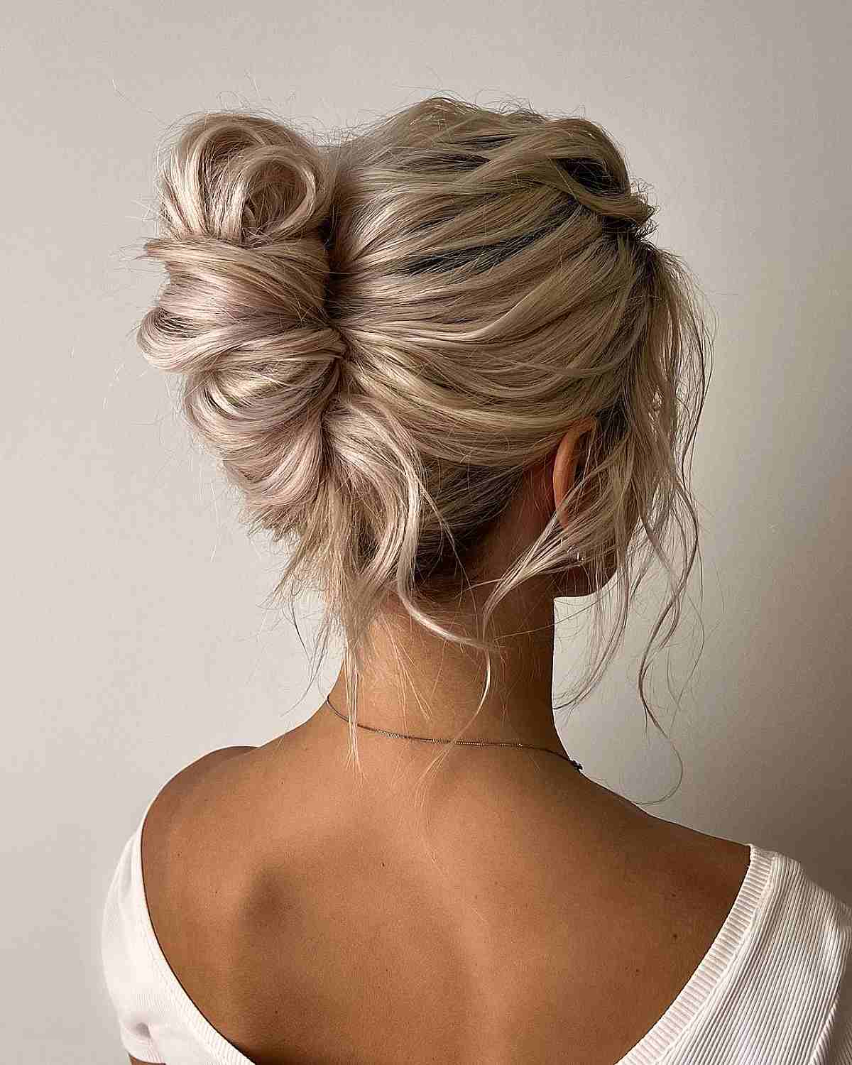 Ash Blonde Messy Bun With Wispy Bangs Ash Blonde Messy Bun With Wispy Bangs — Simple Casual Updo