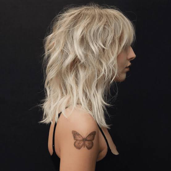 Platinum Shag With Wispy Bangs — Simple Choppy Layers