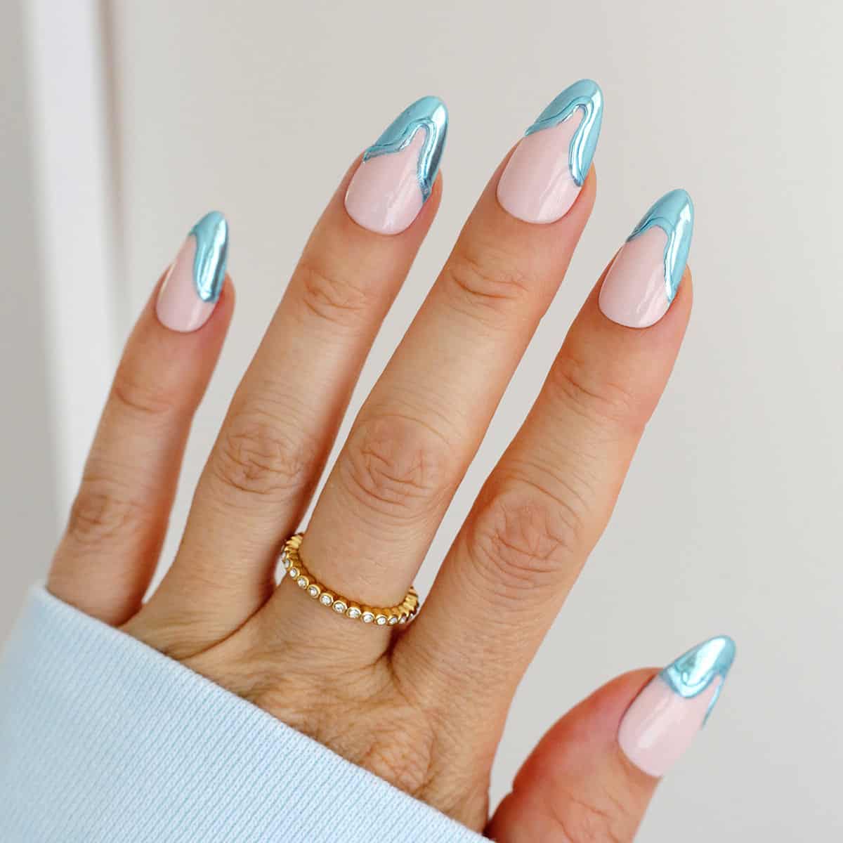 Sheer Pink Light Blue Chrome French Tip Almond Nails, Close-Up Take Sheer Pink Light Blue Chrome French Tip Almond Nails, Close-Up Take — Simple Chrome Nails