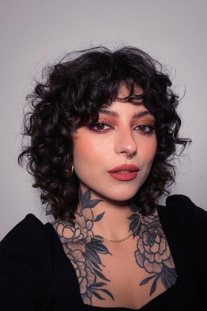 Chin Length Curly Wolf Cut With Full Fringe — Simple Curly Wolf Cut