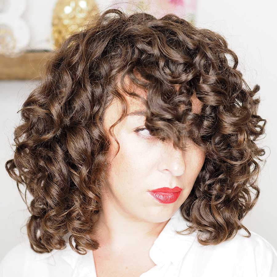 Chin Length Wolf Cut With Wispy Bangs — Simple Curly Wolf Cut