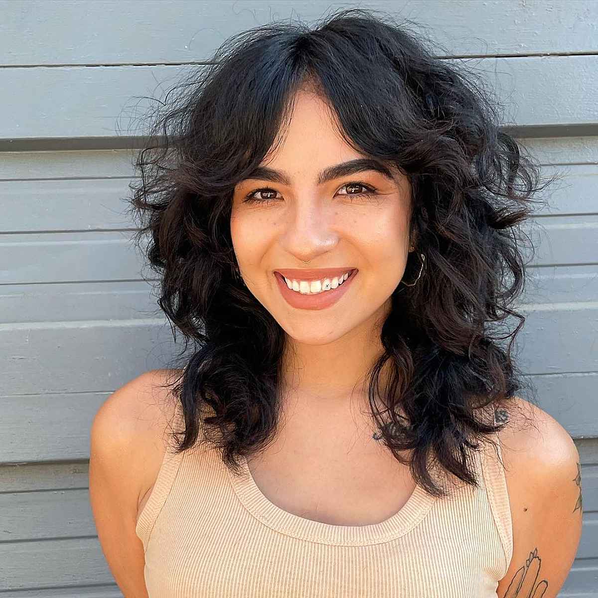 Collarbone Wolf Cut With Shaggy Bangs — Simple Curly Wolf Cut