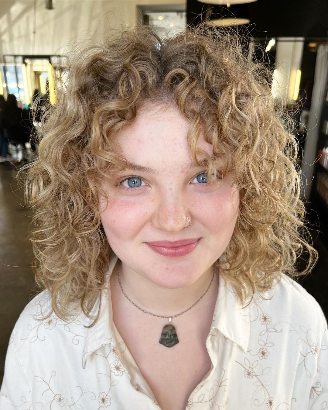 Collarbone Ash Blonde Wolf Cut With Curtain Bangs — Simple Curly Wolf Cut