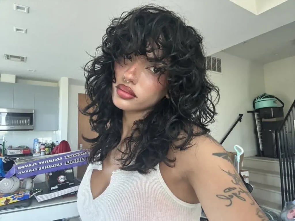 Shoulder Length Black Wolf Cut With Full Fringe — Simple Curly Wolf Cut