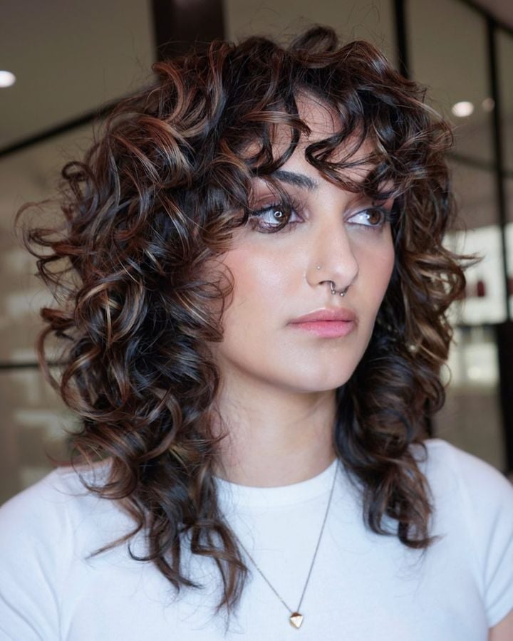 Collarbone Wolf Cut With Voluminous Blowout — Simple Curly Wolf Cut