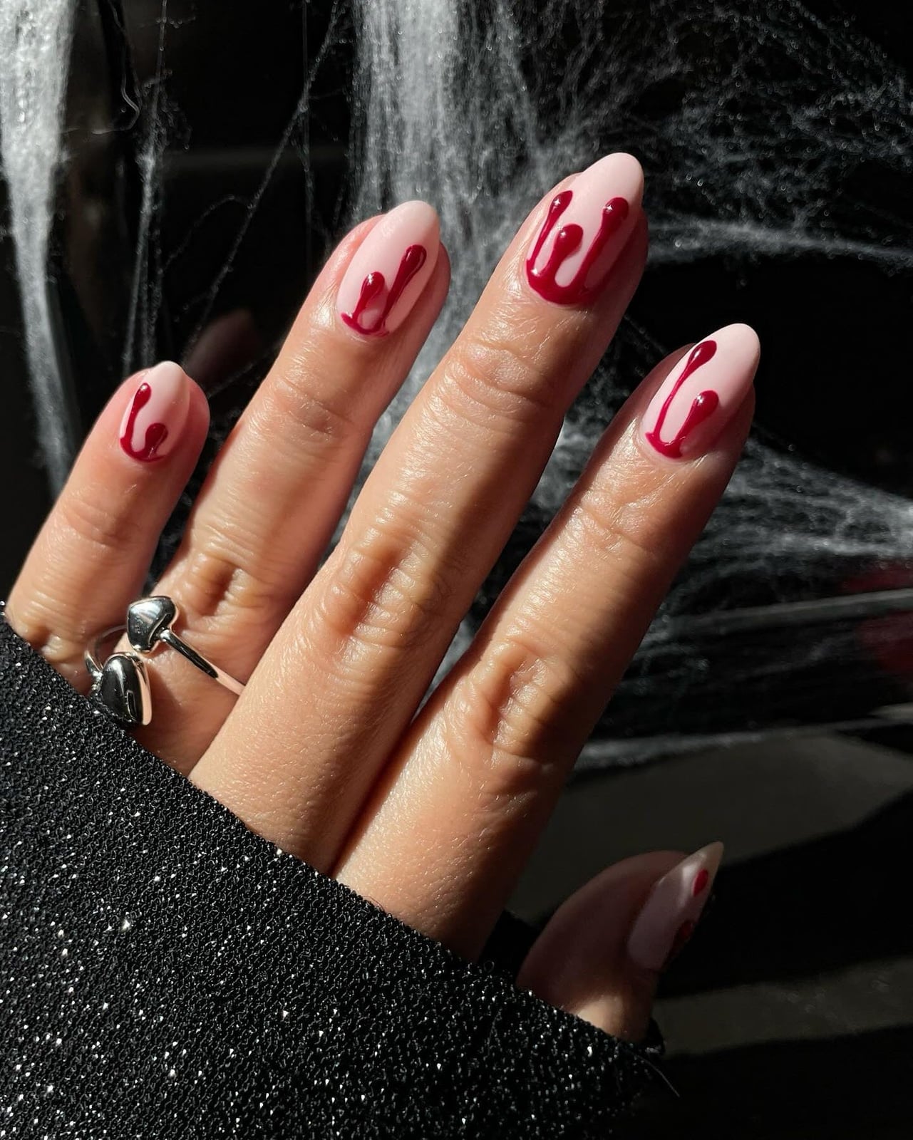 Medium Oval Nude with Thin Red Drips — Simple Drip Nails
