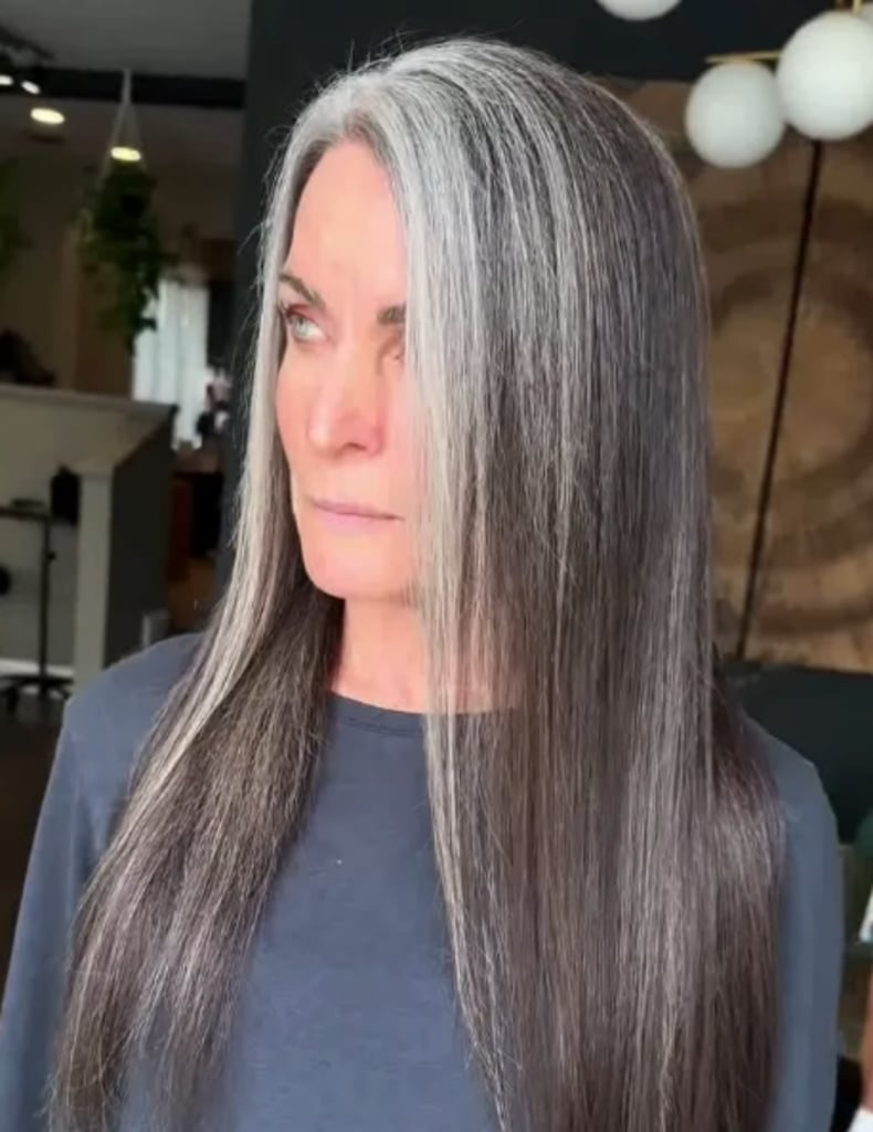 Mid-Back Layers With Bold Gray Streaks — Simple Gray Blending Hair