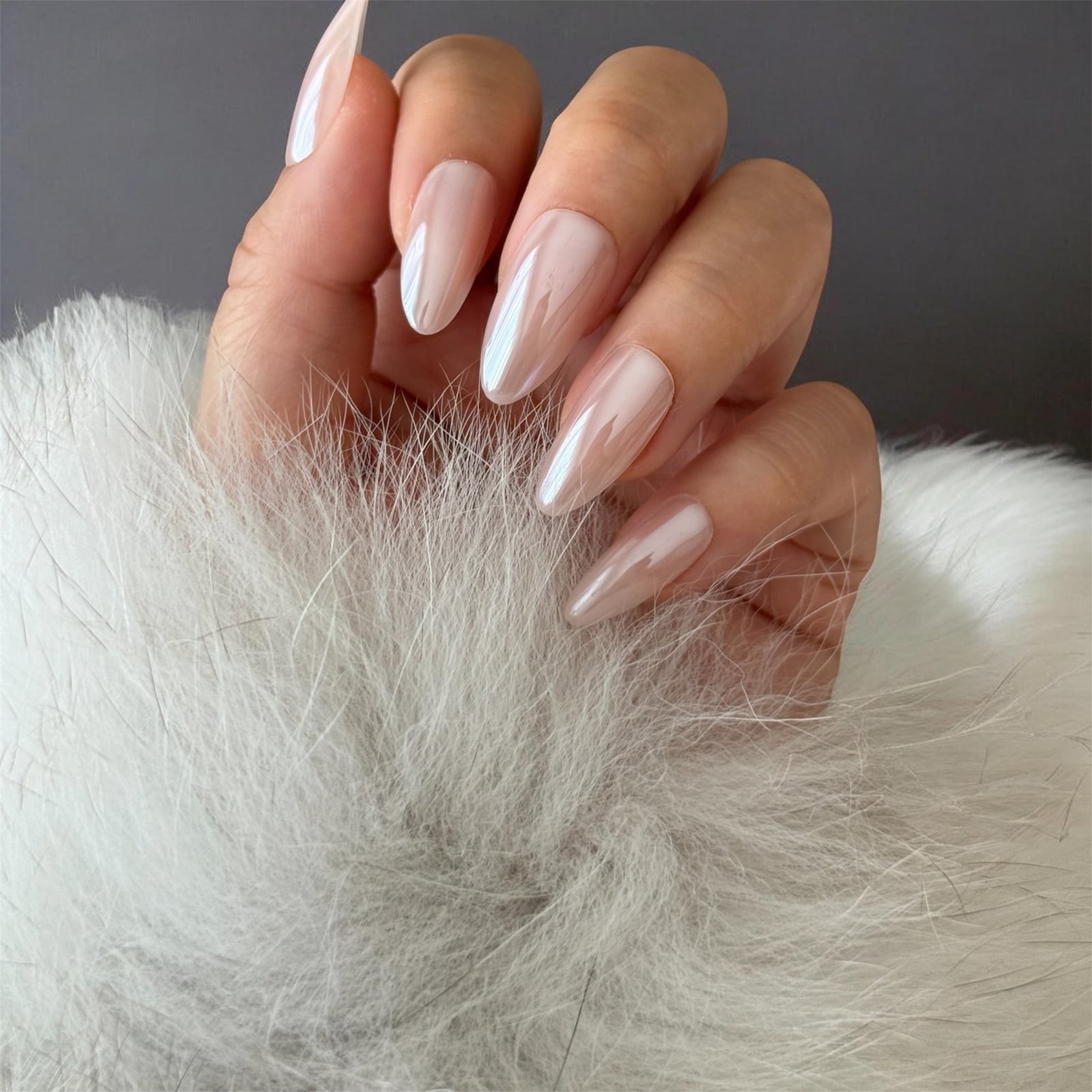 Sheer Pink Pearlescent Long Almond Chrome Nails Sheer Pink Pearlescent Long Almond Chrome Nails — Simple Hailey Bieber Nails