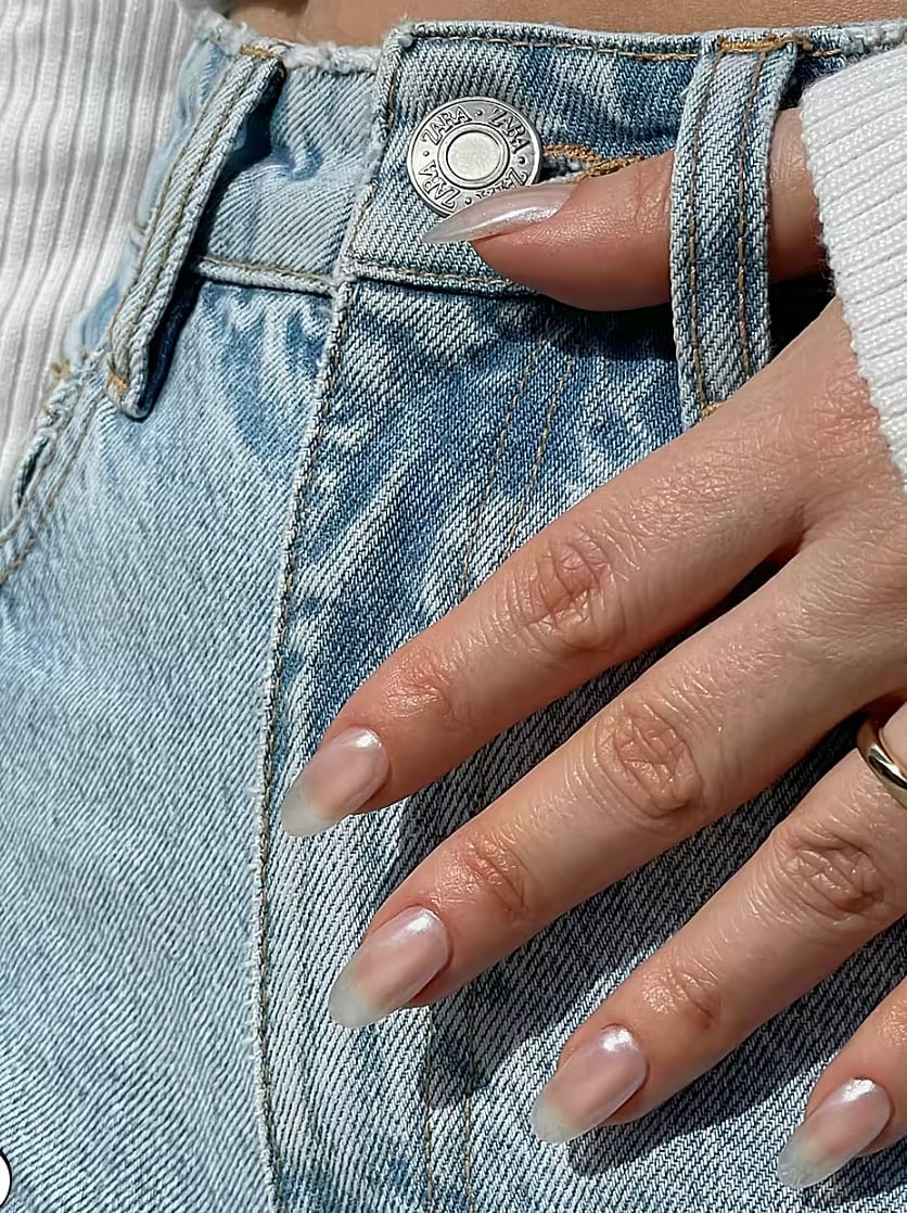 Glossy Sheer Milky Pink Short Almond Nails, Close-Up Take Glossy Sheer Milky Pink Short Almond Nails, Close-Up Take — Simple Hailey Bieber Nails