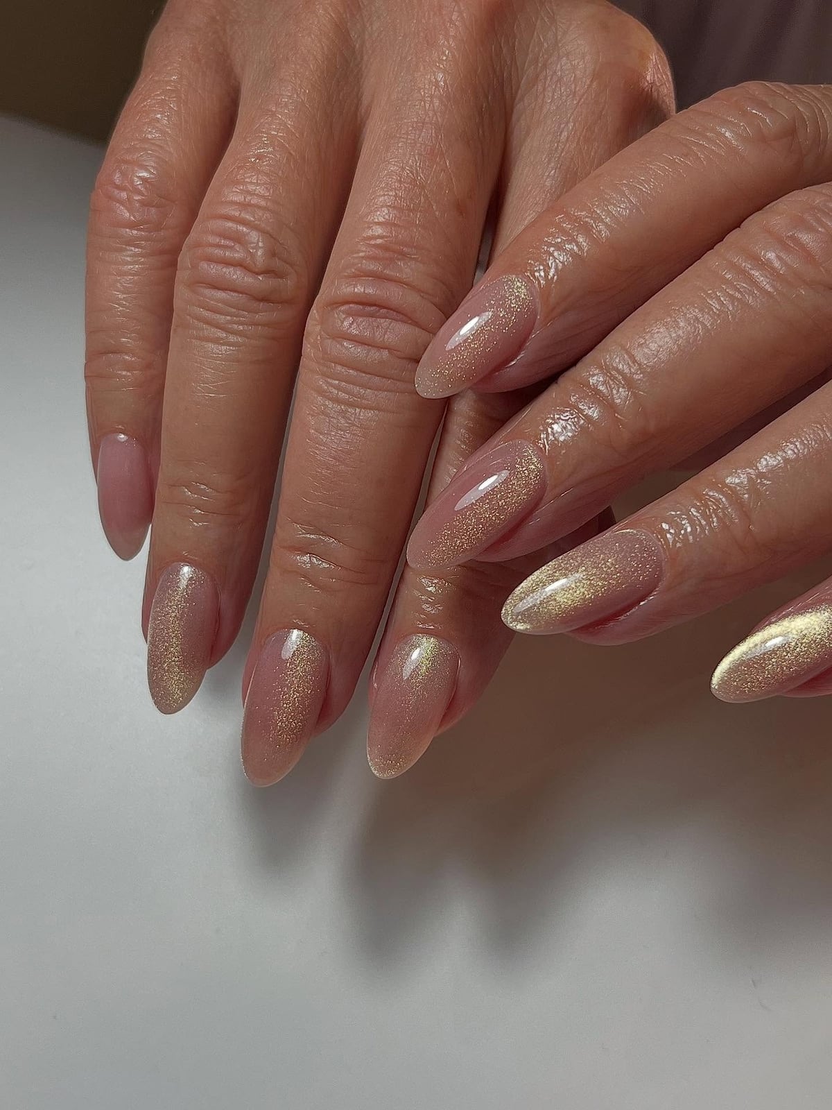 Sheer Pink Gold Shimmer Short Almond Nails Sheer Pink Gold Shimmer Short Almond Nails — Simple Hailey Bieber Nails