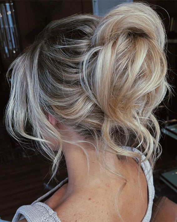Long Ash Blonde Hair In A Messy Bun — Simple Hair Trends for Women