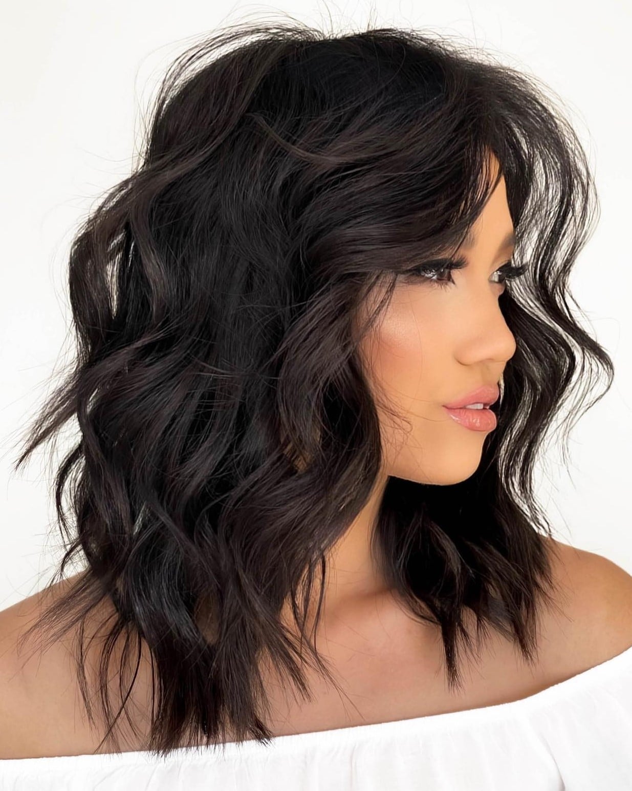 Dark Brown Lob With Face-Framing Curtain Bangs — Simple Haircuts for Wavy Hair