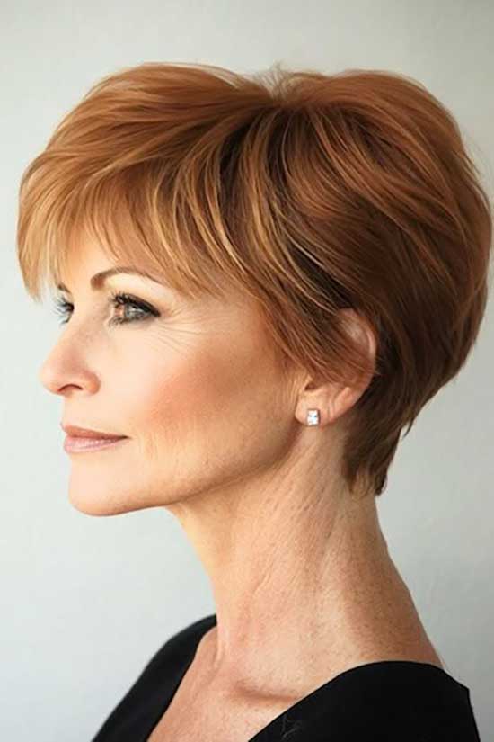 Tousled Ginger Pixie With Textured Bangs — Simple Haircuts for Women over 50