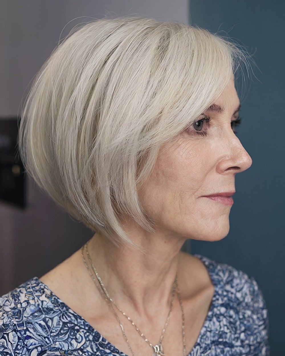 Layered Ash Blonde Bob With Stacked Layers, Visible From The Side View — Simple Haircuts for Women over 50