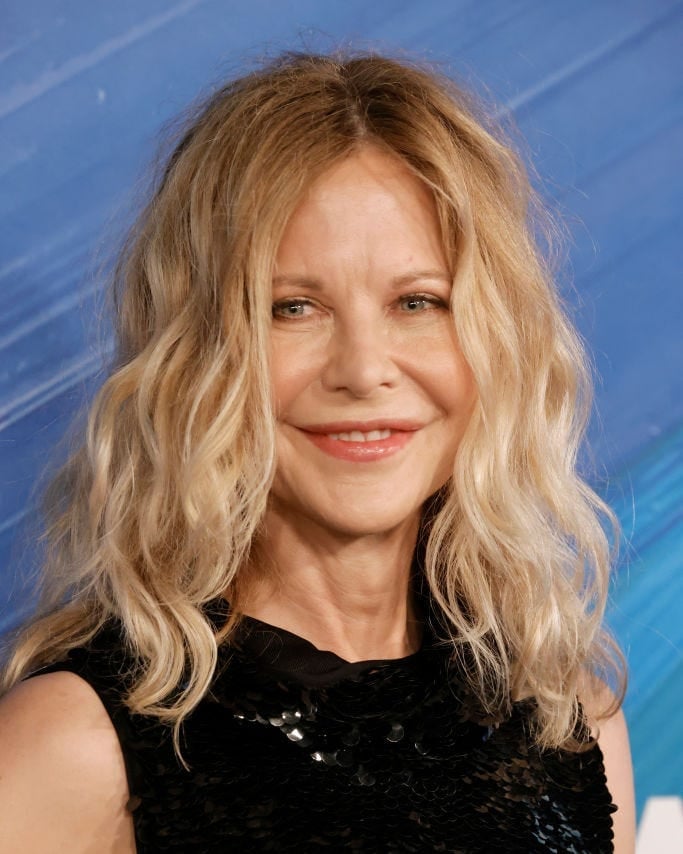 Mid-Back Blonde Layers With Loose Waves Mid-Back Blonde Layers With Loose Waves — Simple Hairstyles for Women over 50