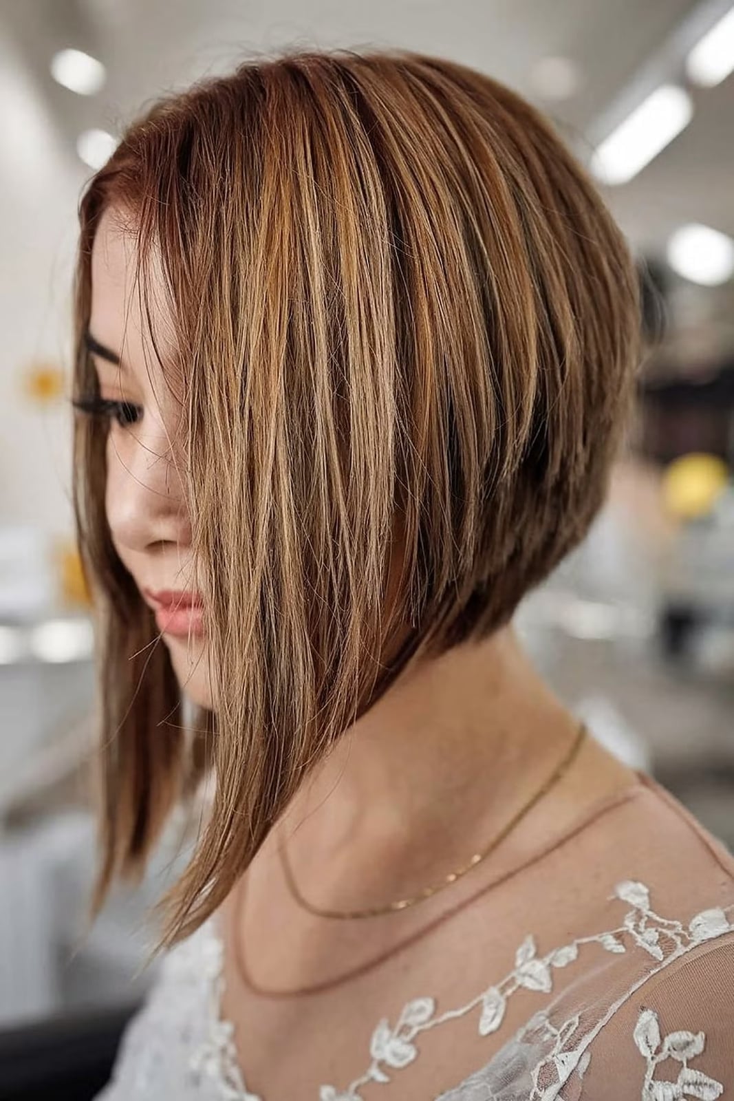 Dramatic Angle Inverted Bob Ear Length — Simple Inverted Bob