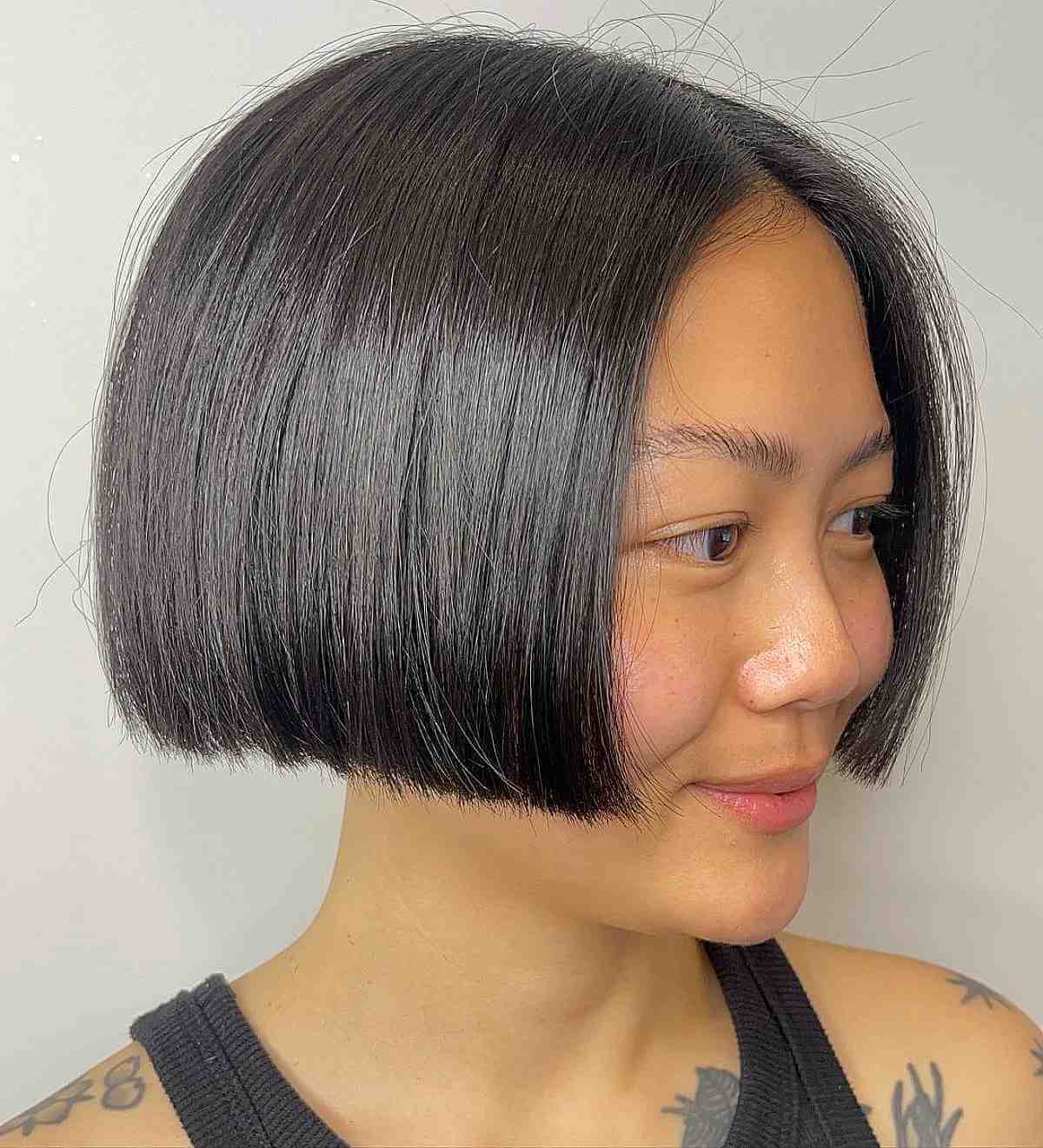 Sleek Black Blunt Bob Profile, Chin Sleek Black Blunt Bob Profile, Chin — Simple Korean Hair