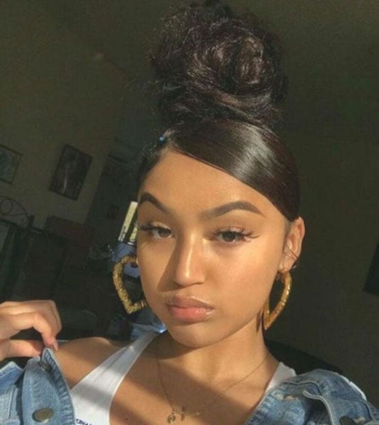 High Bun With Side Swept Fringe High Bun With Side Swept Fringe — Simple Latina Hairstyles