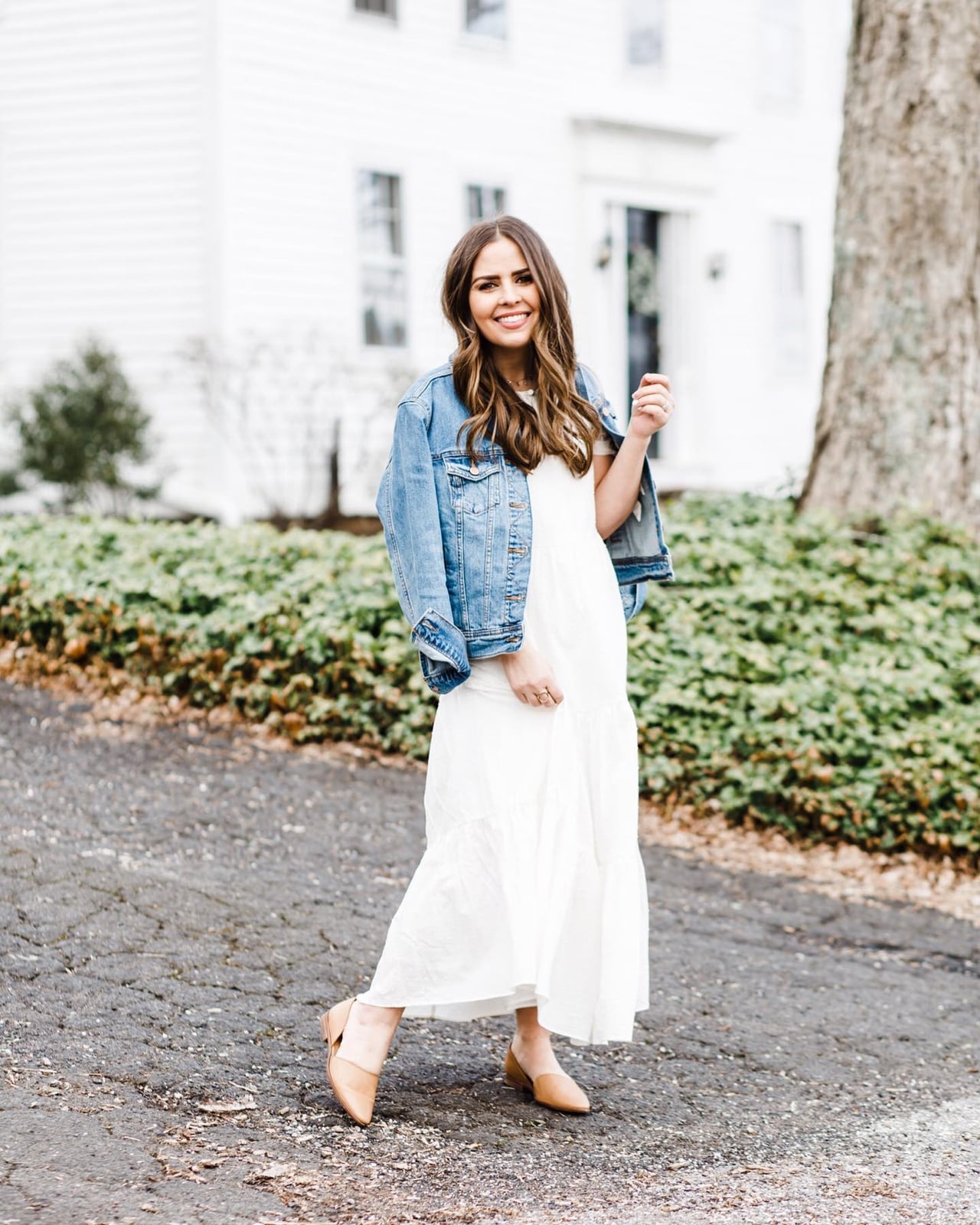 Denim jacket over tiered midi dress with tan flats — Simple Layered Ideas