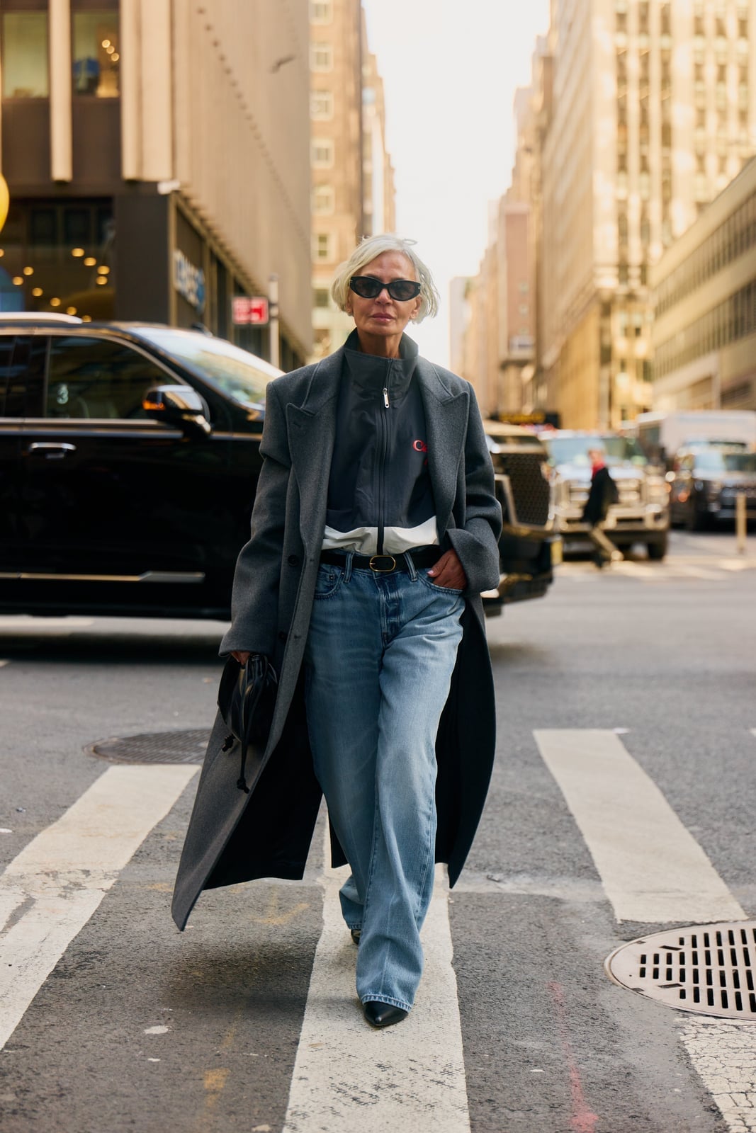 Monochromatic gray coat over zip-up jacket and jeans — Simple Layered Ideas