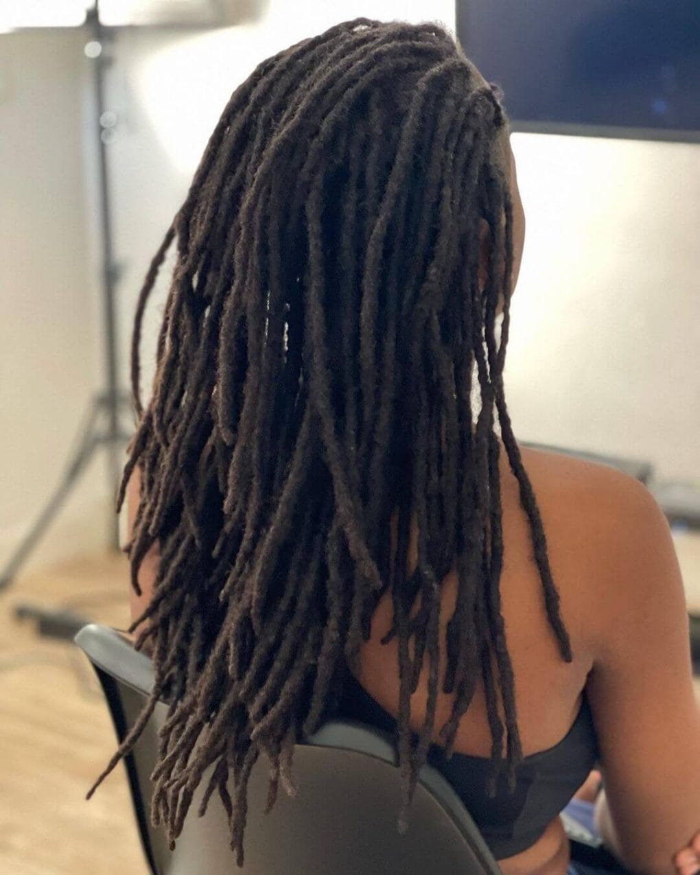 Mid-Back Dark Brown Coily Locs, Long Mid-Back Dark Brown Coily Locs, Long — Simple Length Locs