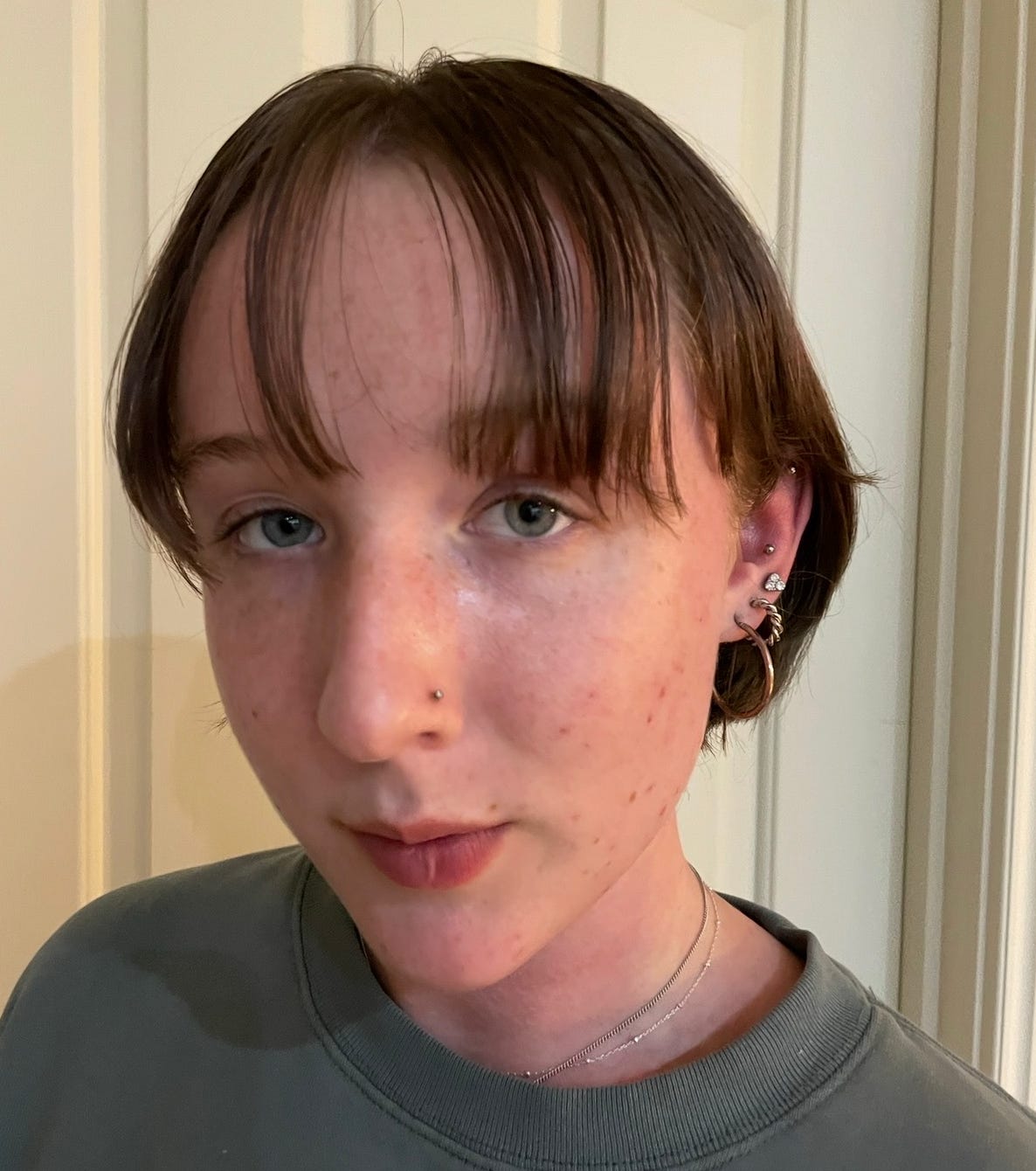 Dark Brown Layered Cut With Blunt Bangs — Simple Lesbian Haircuts