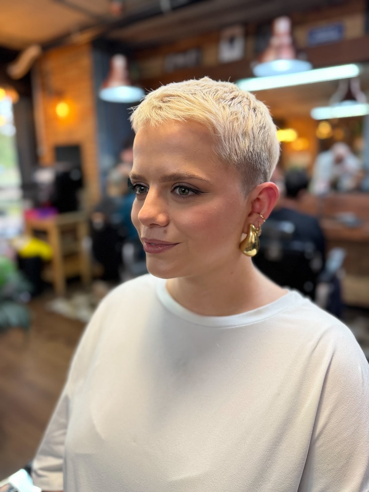 Platinum Blonde Tousled Pixie Cut — Simple Lesbian Haircuts