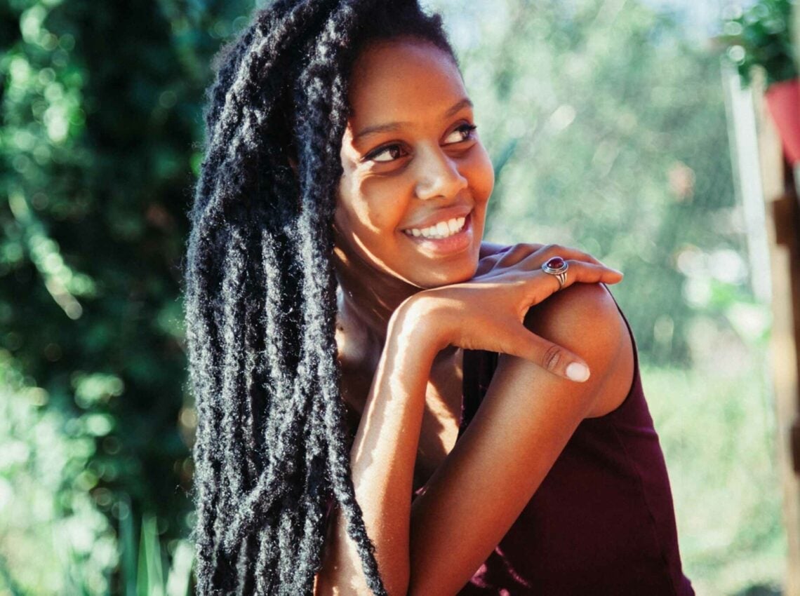 Side View of Long Flowing Black Locs — Simple Locs Hair