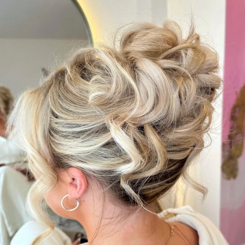 Voluminous Blonde Updo with Face-Framing Tendrils Voluminous Blonde Updo with Face-Framing Tendrils — Simple Loose Updo