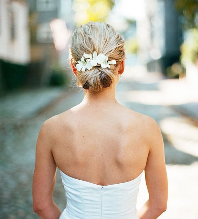 Blonde Low Updo with Floral Accessory Blonde Low Updo with Floral Accessory — Simple Loose Updo